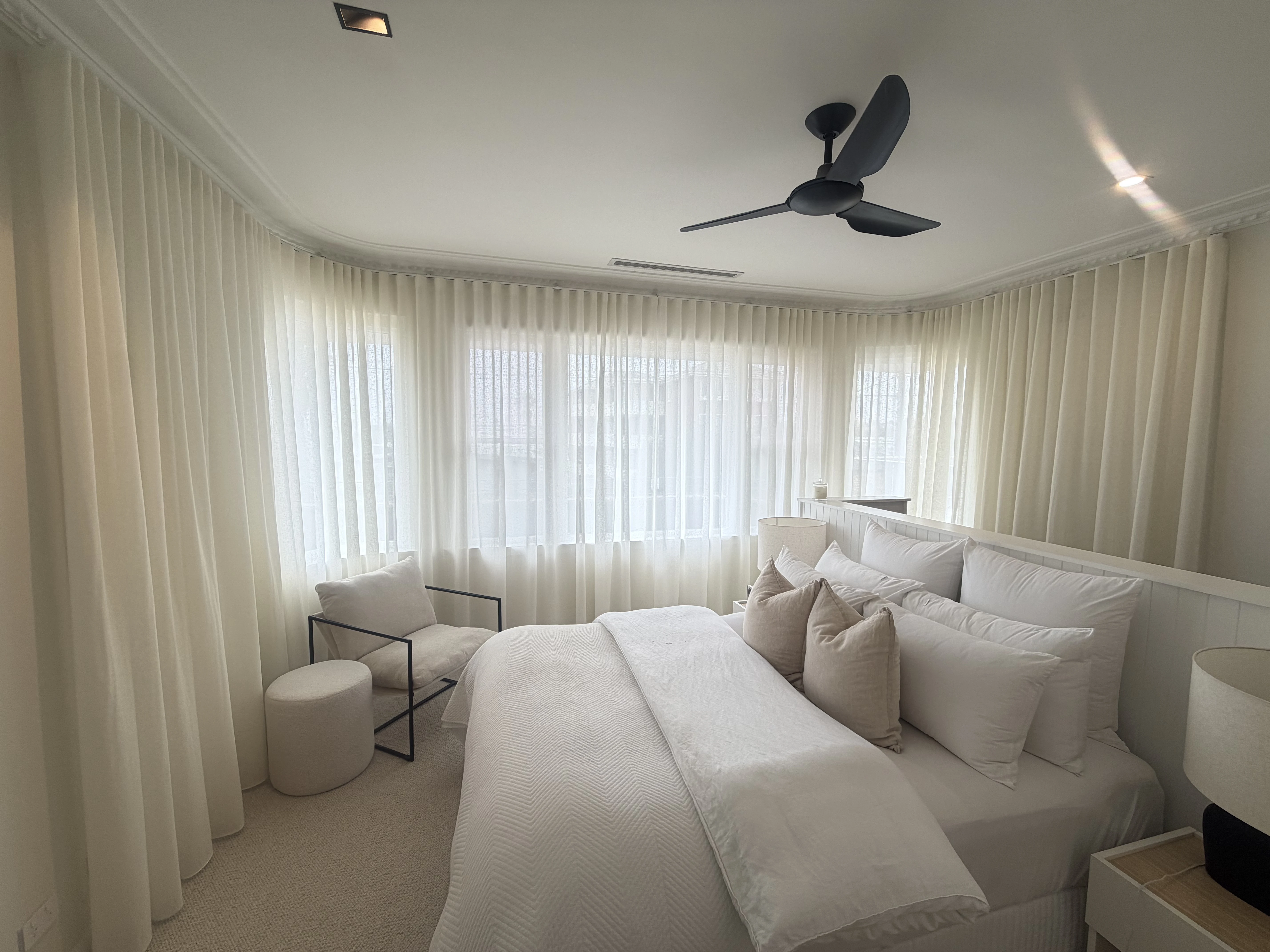 Sheer curtains installed in a Sydney living room