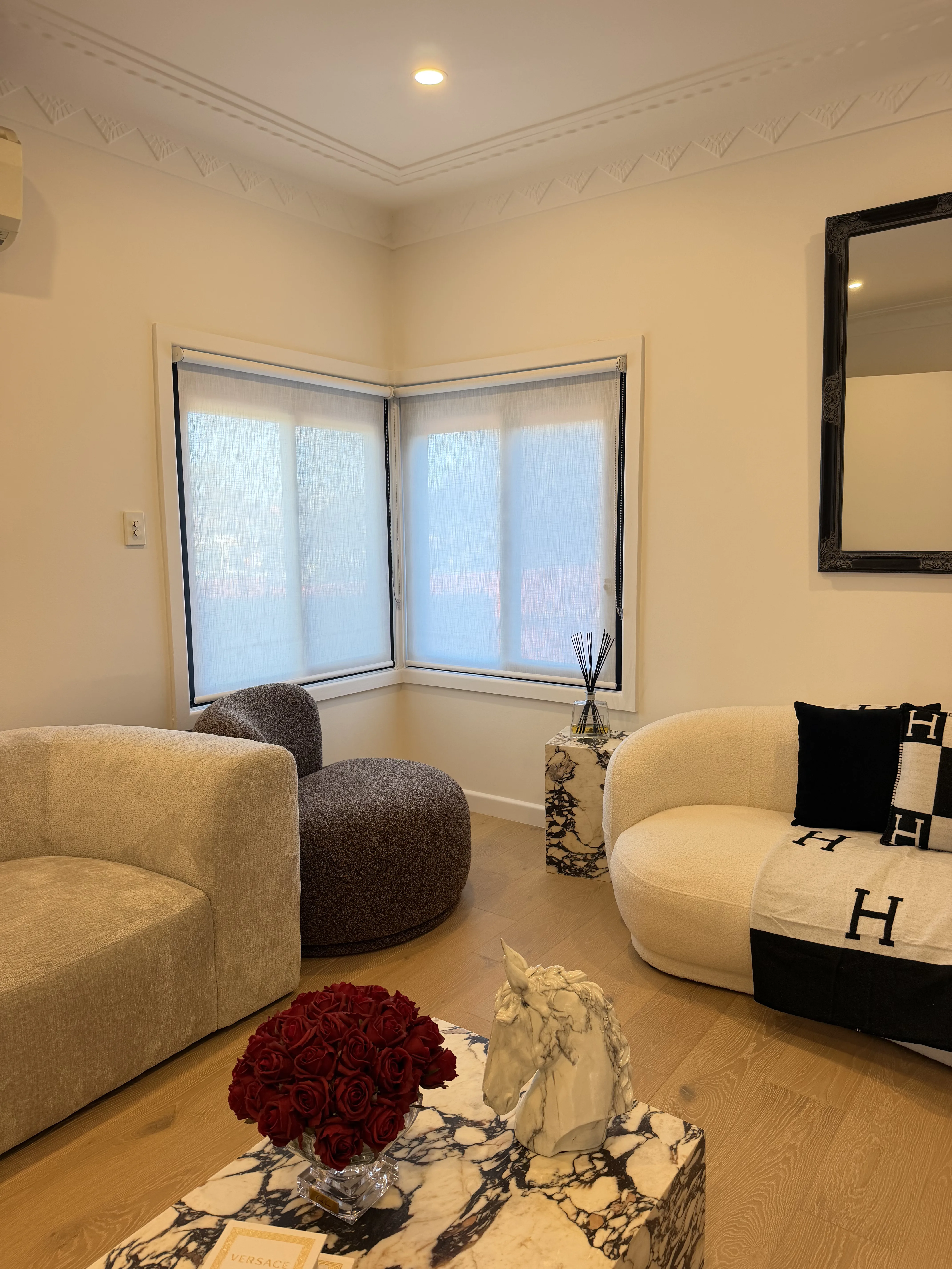 Layered sheer and blockout curtains in a Sydney home