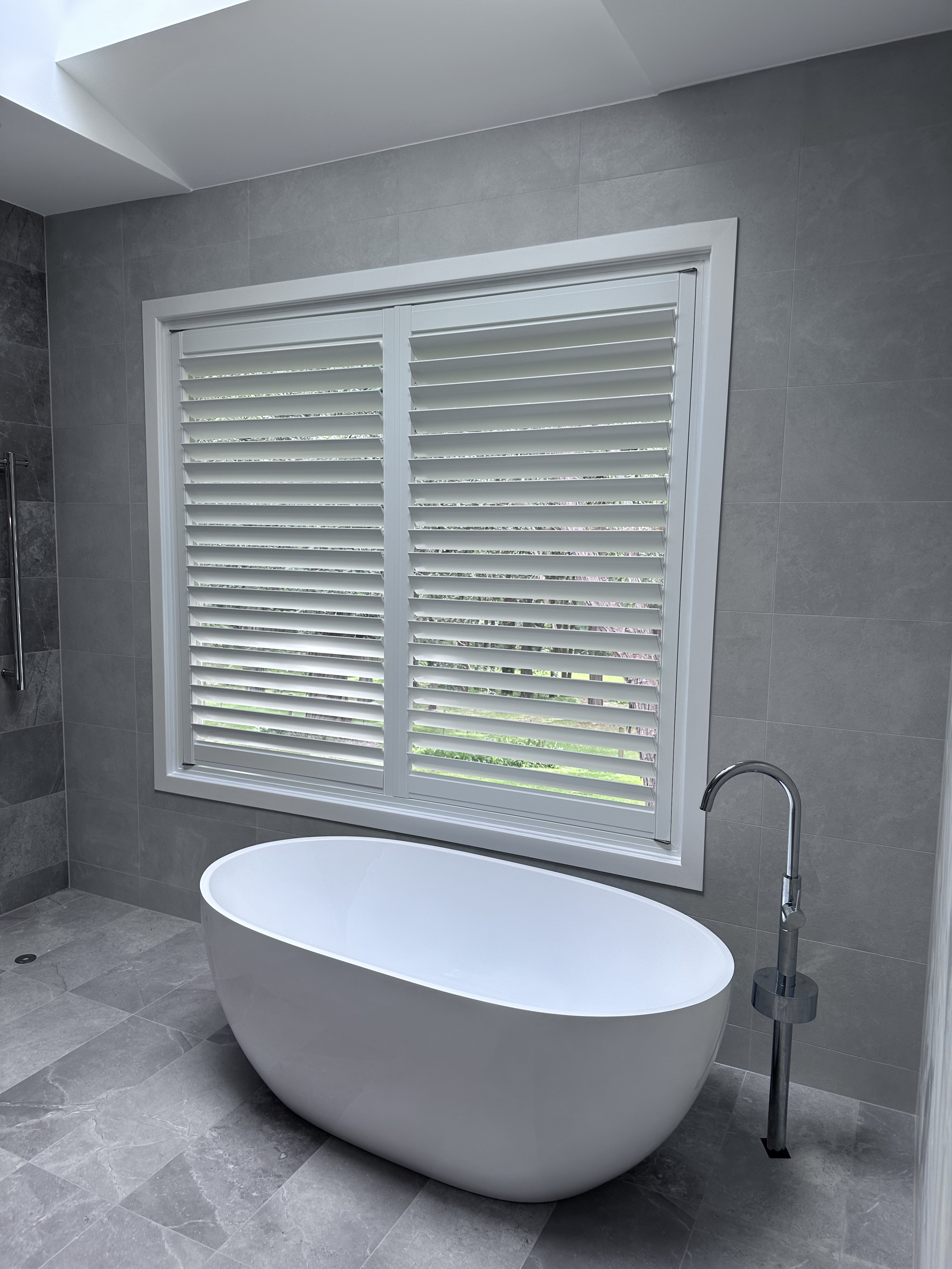 Outdoor patio with retractable awnings