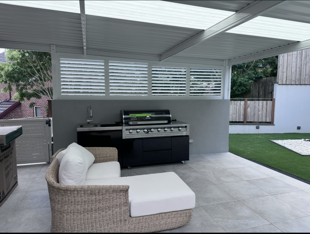 Outdoor patio with retractable awnings