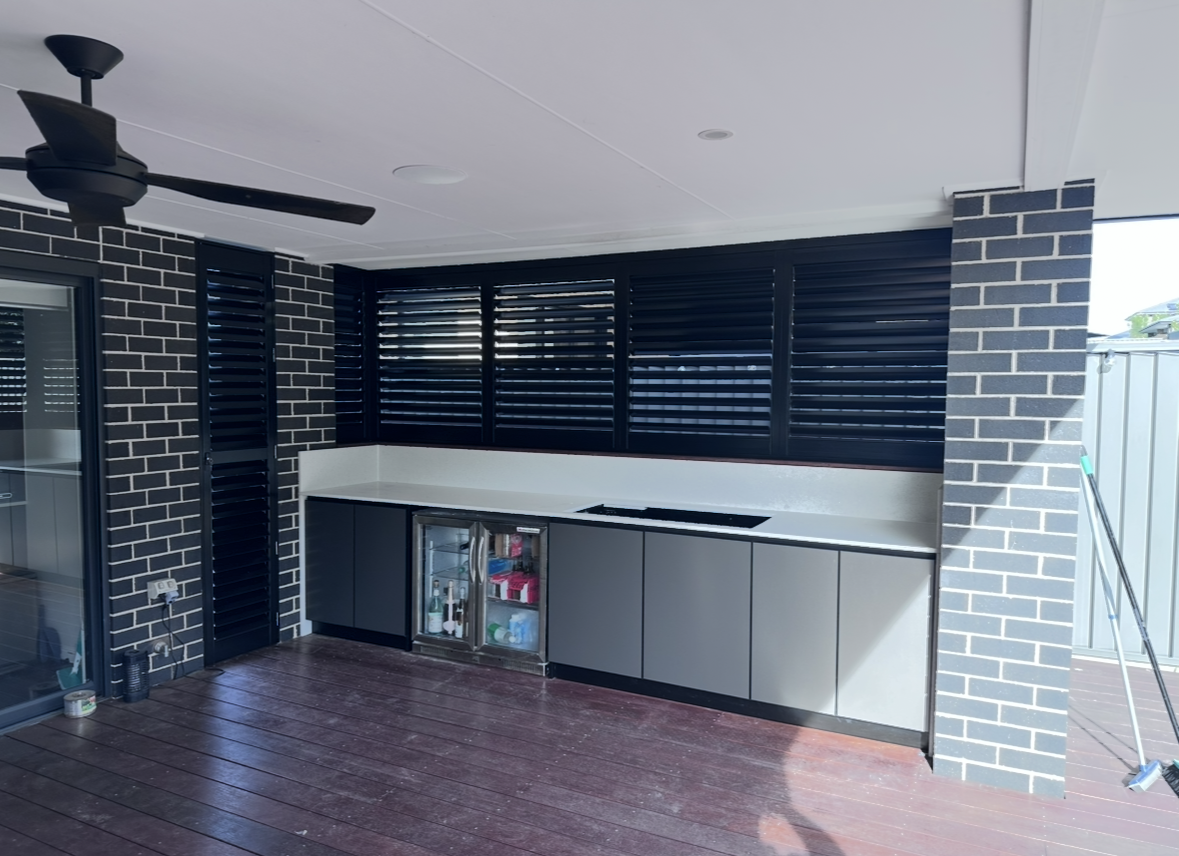 Outdoor patio with retractable awnings