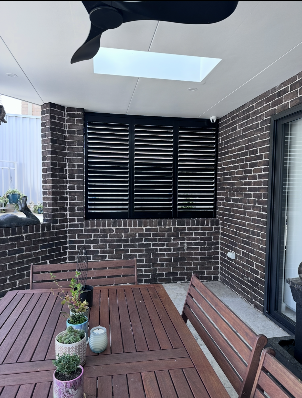 Outdoor patio with retractable awnings